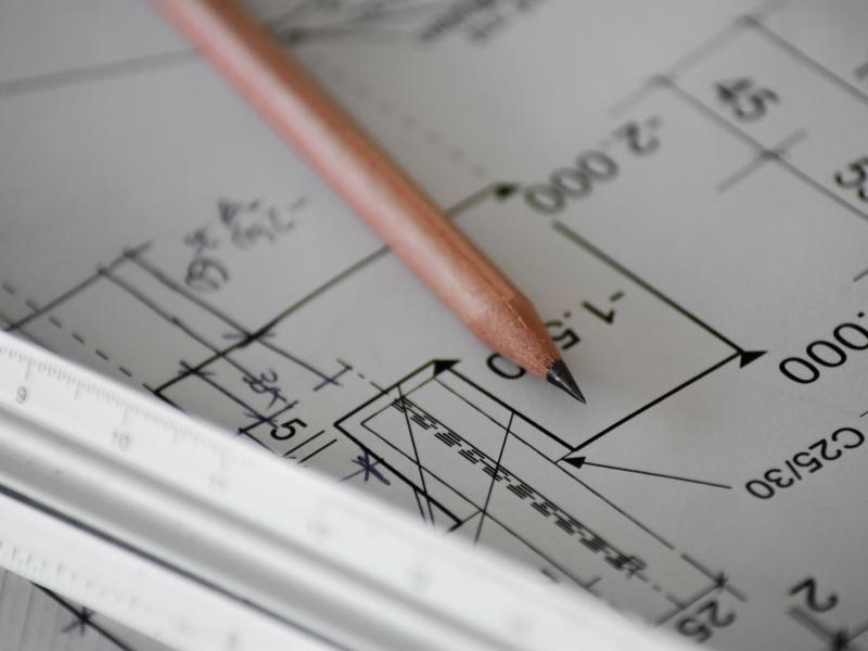 Pencil on top of architectural plans