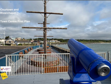 image of the ship at courtown harbour with blue cannon in the foreground
