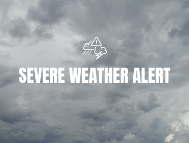 Image of grey clouds with bold text saying Severe Weather Alert with a warning a cloud icon above the text