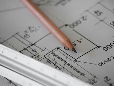 Pencil on top of architectural plans